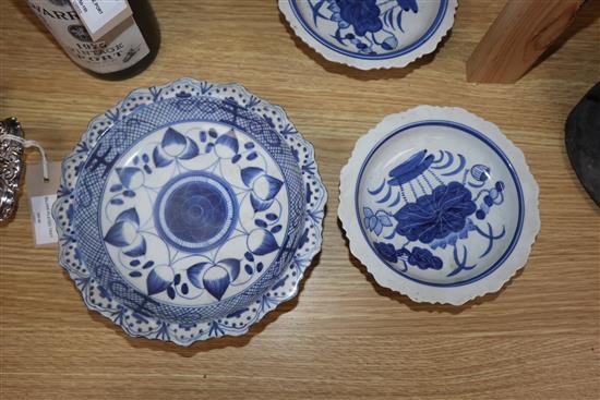 Four Chinese blue and white footed dishes largest diameter 20cm